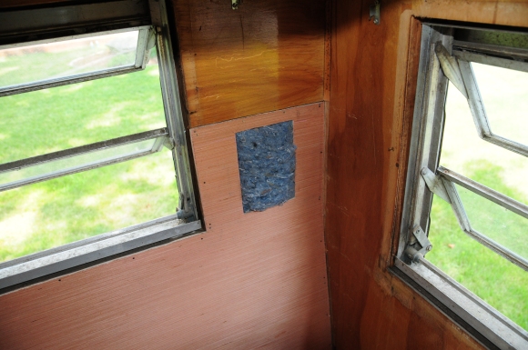 Here's a close-up of the little insulation view-hole. I have a picture frame that will go around that square when everything's finished.